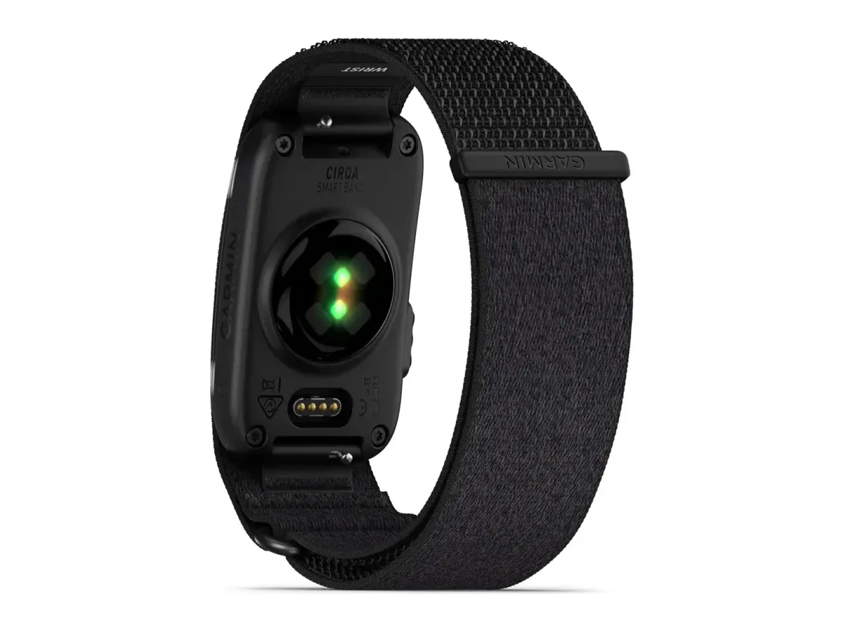 Garmin CIRQA — Underside with the optical heart-rate sensor lit